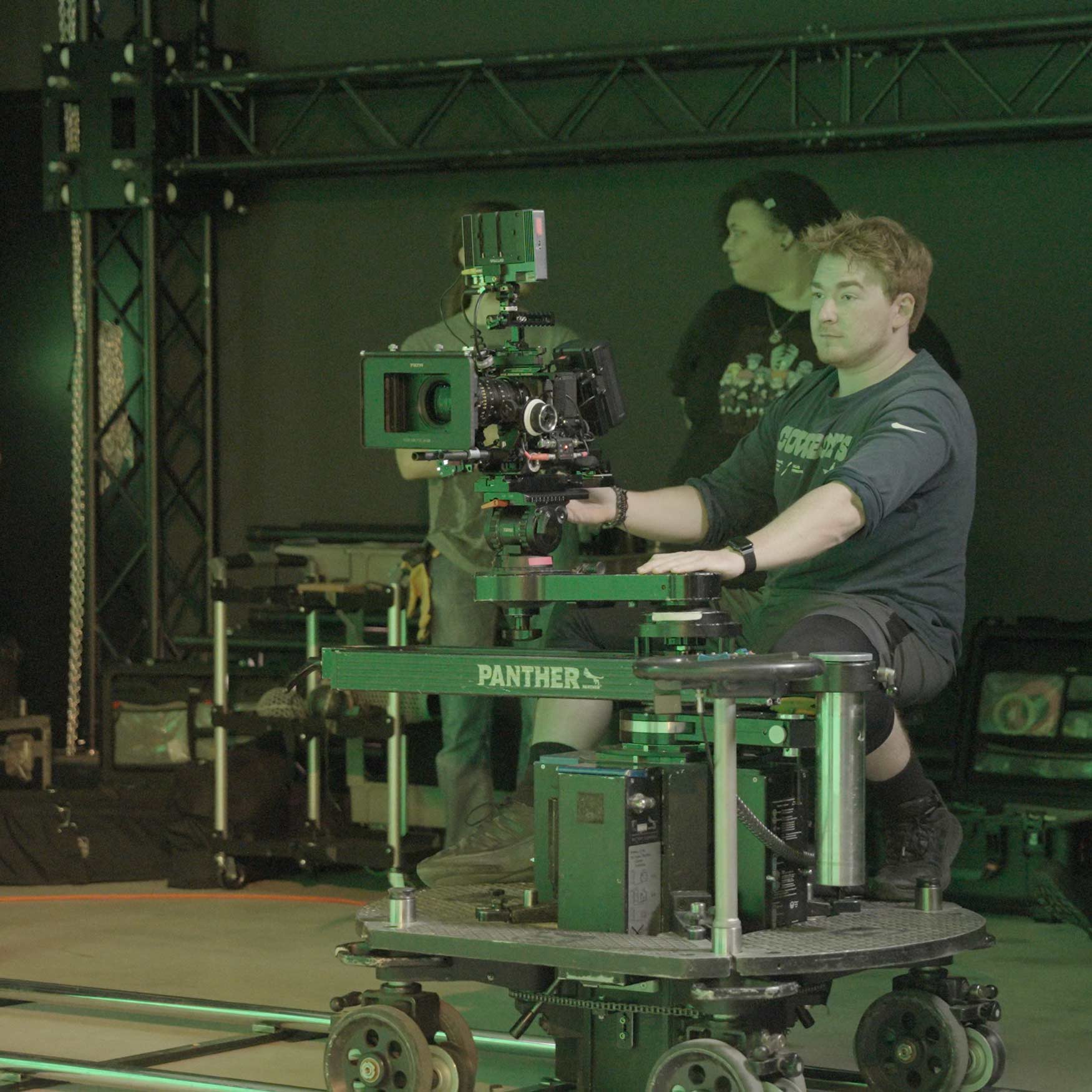 Lighting and camera rigging during a studio shoot