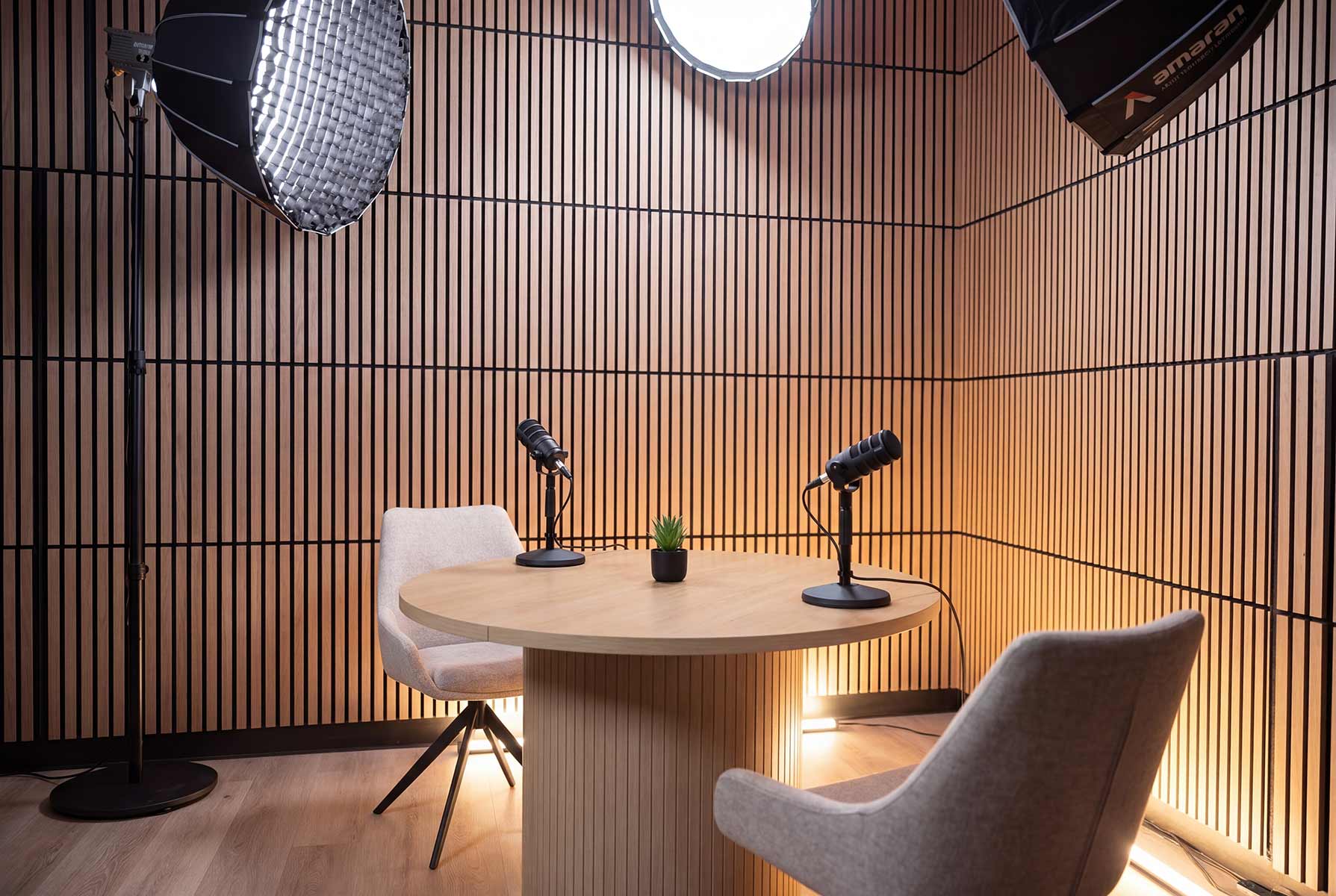 Alternate angle of the Content Studio's interview table and lighting setup